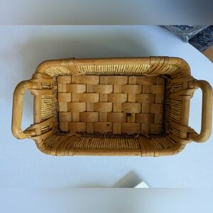 Wood And Natural Leaves Woven Basket.